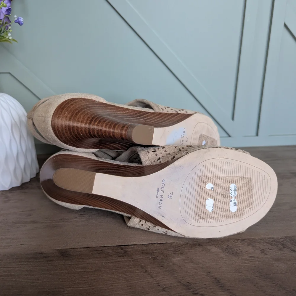 Cole Haan Edie Wedge Booties. These peep-toe wedge sandals